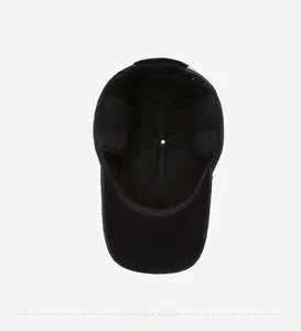 Detailed interior view of winter baseball cap showing thick lining and cross stitching