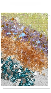 Macro view of 100 mixed-shape colorful flat-bottom glass rhinestones for nail art designs