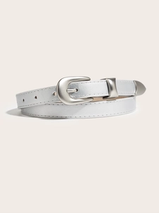 Close-up of vintage silver thin belt with matte pin buckle and fine stitching detail