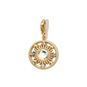 Close-up of a gold-plated stainless steel sunburst pendant with sparkling zircon stones