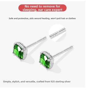Close-up of S925 sterling silver hallmark on square green emerald stud earrings