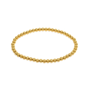Vista dettagliata del bracciale a sfere dorate con sfere di metallo lucide e riflettenti