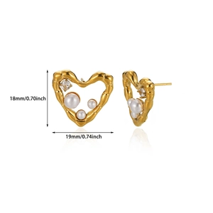 Detail showing dimensions of heart-shaped gold earrings with pearls and zircons