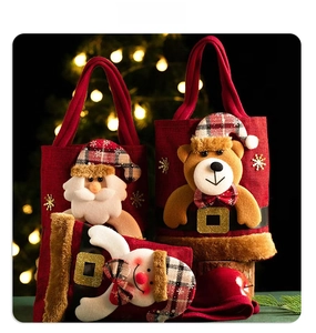 Christmas gift bags featuring 3D Santa, bear, and snowman motifs with festive sequins