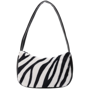 Chic zebra print faux fur baguette bag with black leather straps on a white background