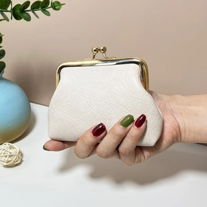 Mini vintage cream kiss-lock coin purse with lychee pattern and gold metal clasp
