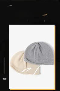 Detailed close-up of grey and beige knitted beanies with soft ribbed texture