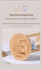Close-up of 10-minute bamboo hourglass with blue sand and time engraving on wood