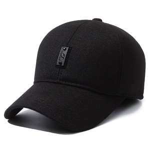 Men's winter thermal baseball cap in black cotton with ear protection and leather patch