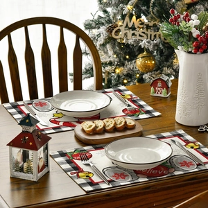Detailed close-up of festive Christmas placemats with Believe text on wooden table