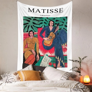 Detail view of Henri Matisse wall tapestry hanging as a centerpiece above a cozy bed