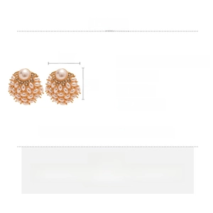 Detailed view of vintage faux pearl and rhinestone geometric earrings with size specs