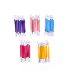 Close-up of 8-piece double-headed cake fondant modeling tools with colorful handles