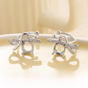 Close-up of U-shaped bow ear clip component with 8-sided 6mm rose cut zircon setting