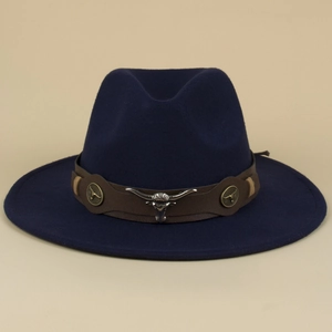Close-up of dark blue felt fedora with brown leather band and silver bull head detail