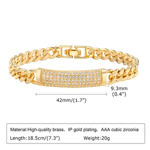 Detail of gold Cuban chain bracelet with paved AAA cubic zirconia and brass IP plating