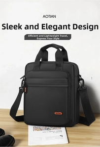Close-up of black business briefcase featuring a sturdy handle and adjustable strap