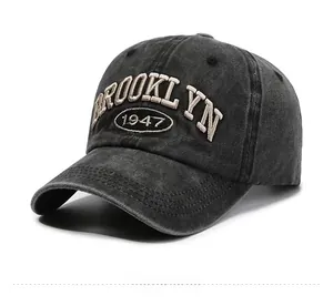 Detail view of 3D Brooklyn 1947 embroidery on vintage washed dark grey baseball cap