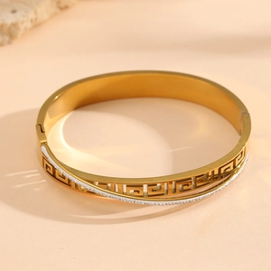 Luxury gold titanium steel bracelet with Greek fret pattern and sparkling pave crystals