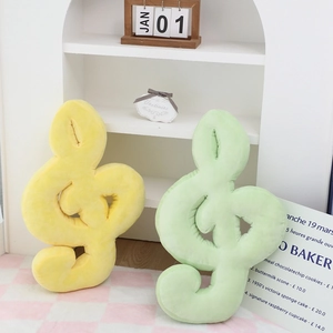 Coussins en peluche forme note de musique jaune et vert pour canapé et salon