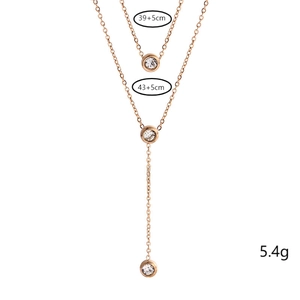 Detailed view of layered rose gold titanium necklace with size and weight parameters