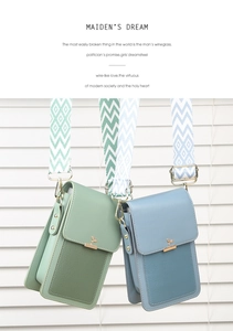 Close-up of small crossbody phone bags with gold grass-shaped buckles and wide straps