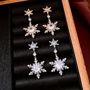 Elegant 18k gold plated snowflake drop earrings with sparkling crystals in a luxury box