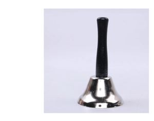 Detailed view of silver metal handbell with a smooth black wooden handle