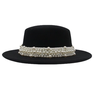 Classic black wool felt boater hat for women featuring elegant white pearl band decoration