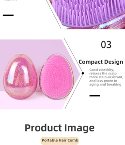 Detail of pink and purple glitter egg-shaped hairbrush with flexible soft bristles