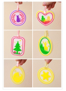 Detailed relief patterns on colorful resin Christmas tree and snowflake hanging tags