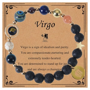Detail of Virgo zodiac beaded bracelet with lava stone and constellation metal charm