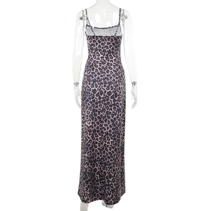 Detail of slim fit backless dress showing leopard print and spaghetti straps