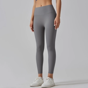 Front view of high waist seamless yoga leggings in grey with a supportive compression fit