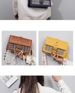 Detail view of stylish color-block crossbody bags with metal buckle and wide straps