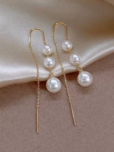 Elegant gold-tone long tassel earrings with three gradient pearls and U-shaped ear hooks