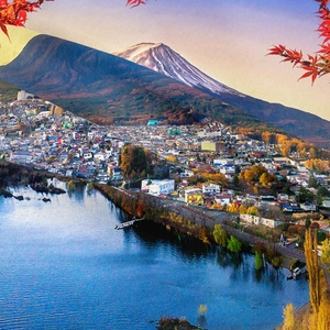Artistic detail of Mount Fuji with red maple leaves on a woven canvas tapestry background