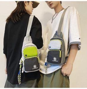 Detail view of water-resistant street style chest bags in light grey and checkered patterns