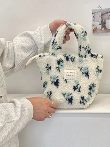 Süße weiße Plüsch-Handtasche mit blaugrünem Blumenmuster und Tragegriffen für Damen