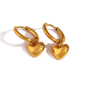 Minimalist gold heart earrings for women featuring a polished metallic finish on white back