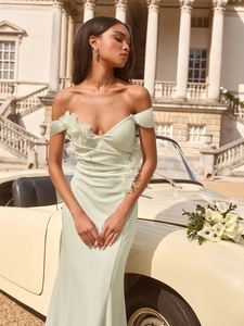 Elegant light green V-neck evening dress with 3D floral accents and a slim fit design