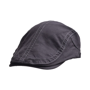 Detail of dark grey retro beret showing premium canvas texture and double stitching