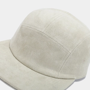 Light gray suede five-panel baseball cap with a wide brim in a minimalist vintage style