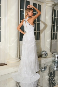 Detail of white sequin halter evening gown featuring sparkling rhinestone neckline