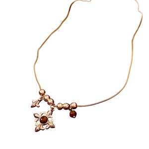 Vintage tiger eye bead necklace with rose gold cross pendant and floral retro design