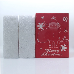 Detailed view of Merry Christmas red gift box and protective foam packaging inserts