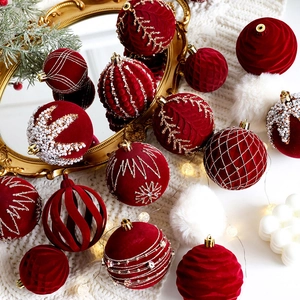 Deep red velvet Christmas ball ornaments with intricate pearl and sequin embroidery details