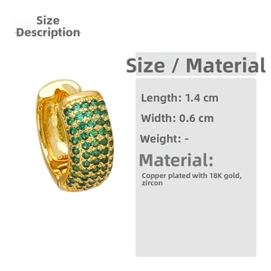 Detail of 18K gold plated hoop earrings featuring green cubic zirconia inlay, 1.4cm size