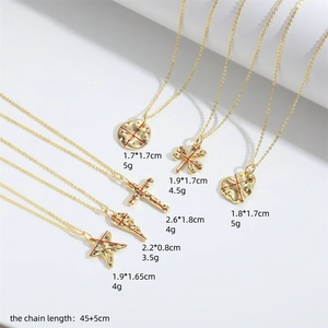 Gold clover and star necklaces with colored zircons, including sizes and weight details