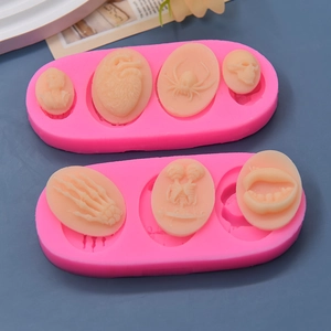 Two-pack Halloween egg-shaped silicone molds for DIY cakes featuring skulls and spiders